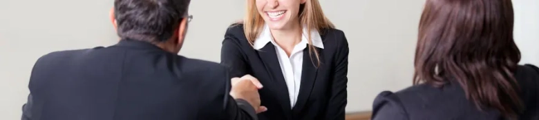 woman in a suit at an interview